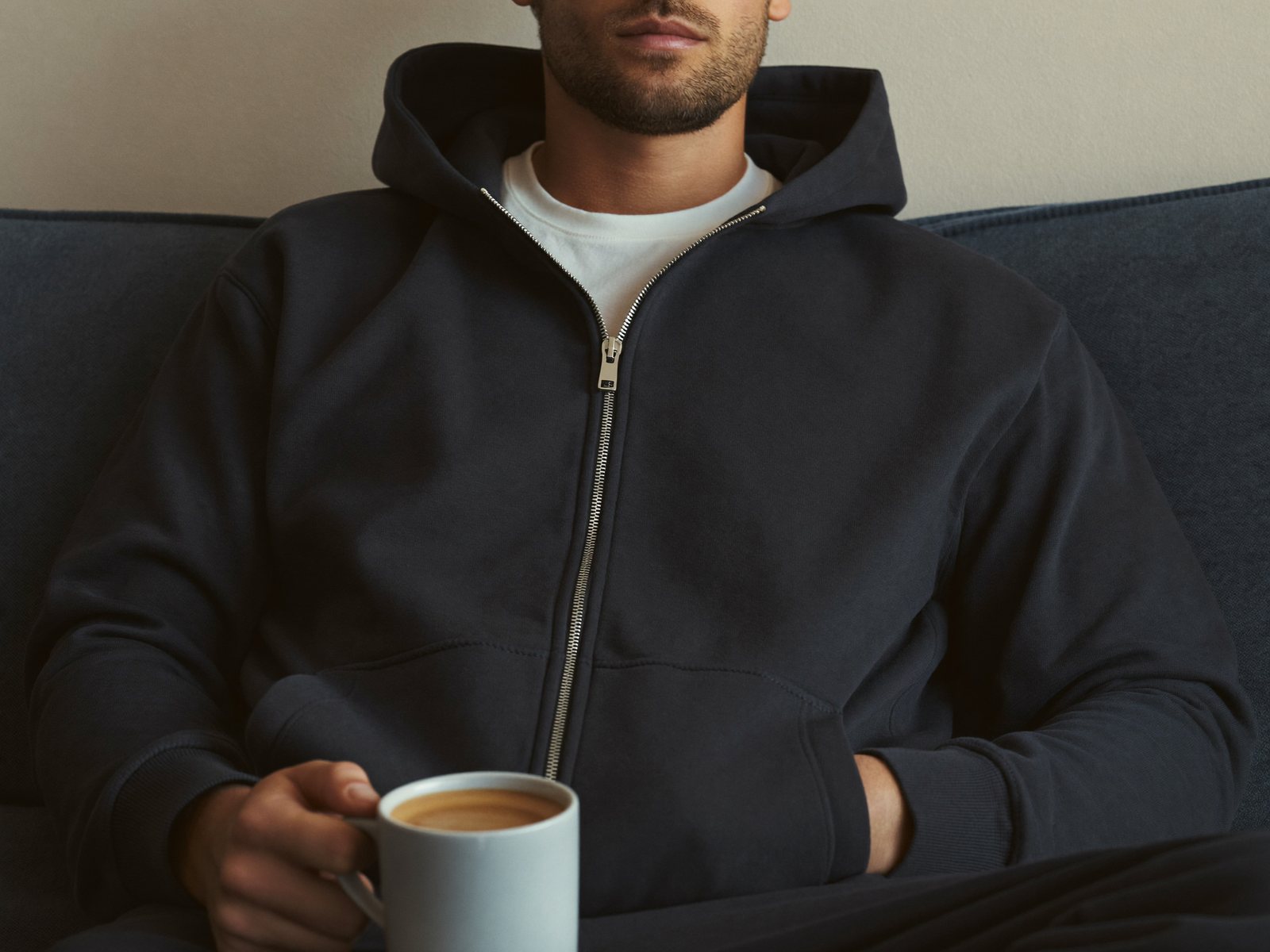 A relaxed man at home, calm and comfortable during an easy recovery