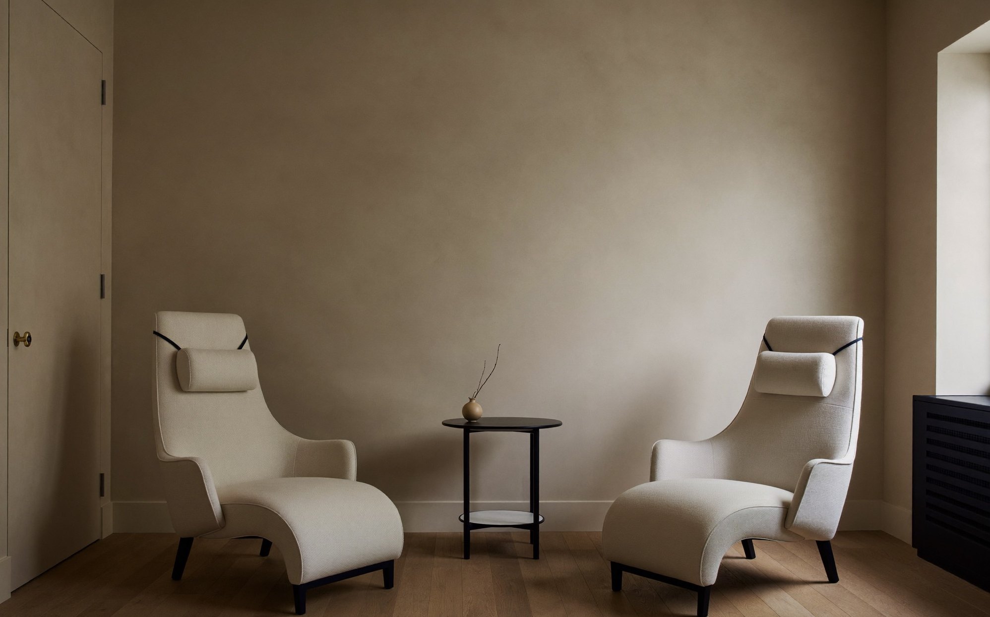 A serene, private clinic consultation room &mdash; calm and confidential